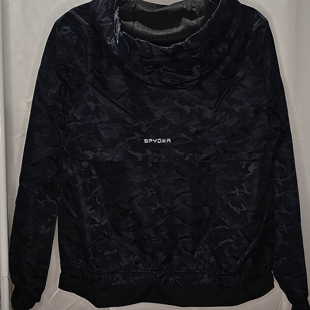 Brand new Spider blue and black women active jacket in size medium.